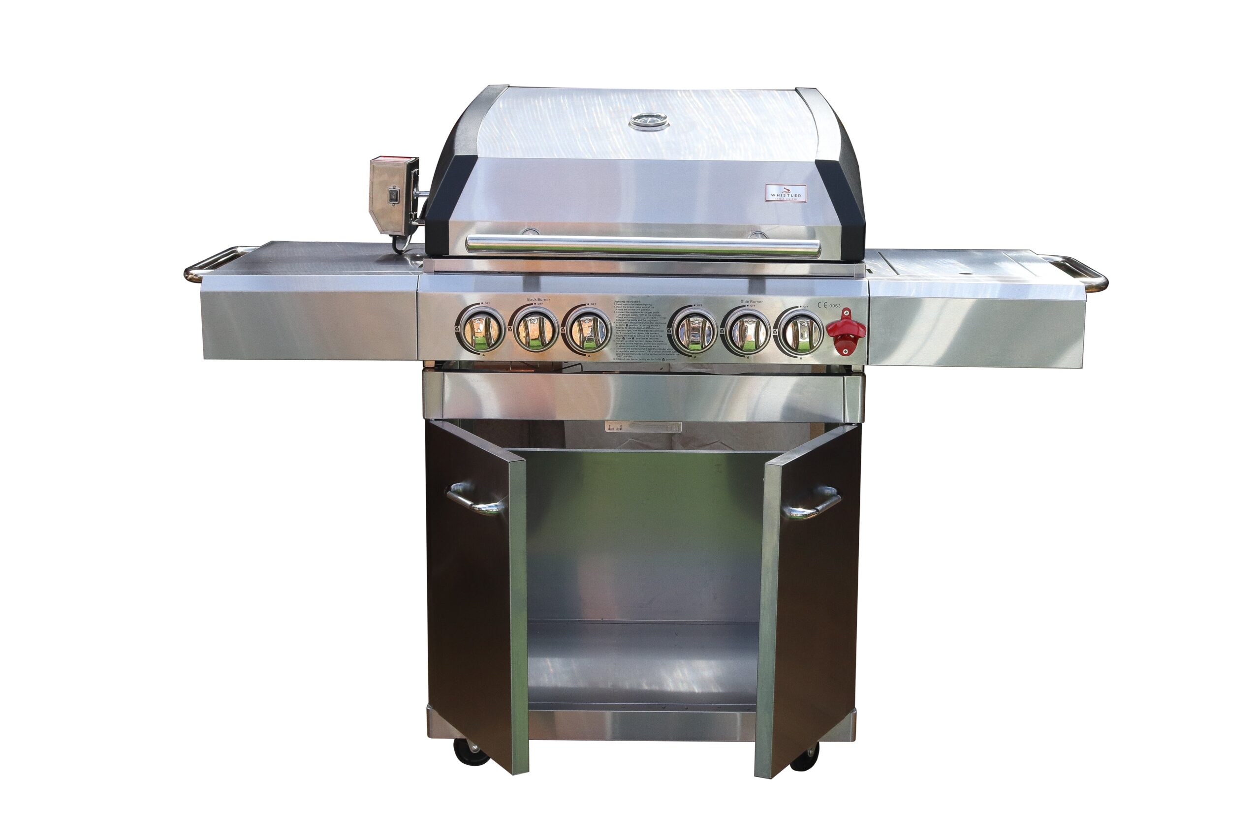 images Whistler Broadway Gas BBQ/Grill showing lidded BBQ, workspace to either side and a cupboard beneath. The unit is stainless steel with black. there are 6 control knobs on the front panel together with a bottle opener.